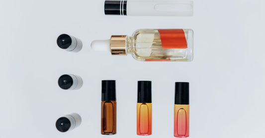 A flatlay of colourful essential oil bottles from the best essential oil sets UK 2026