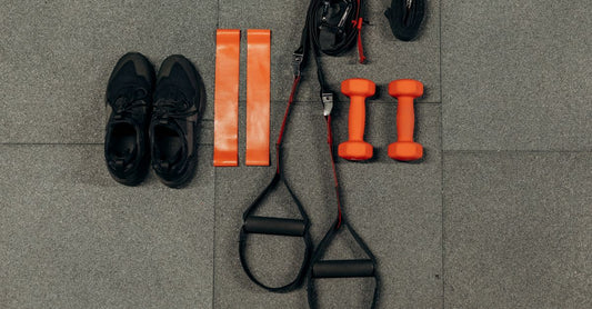 Three pairs of shoe insoles arranged on a light surface, showcasing different arch support designs for the best insoles UK 2026 guide.