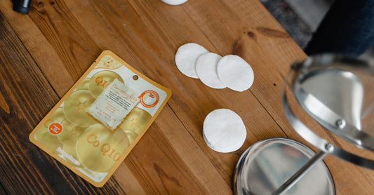 Witch hazel pads for hemorrhoids in packaging on a clean surface.