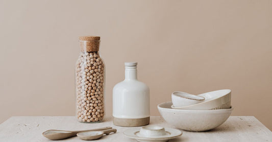 Selection of B8 (inositol) supplement capsules and powder jars on a clean surface, showcasing UK online buying options