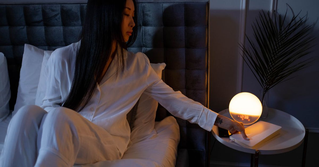 Best sleep sound machines UK 2026 on a nightstand with a soft night light glow