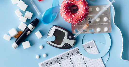 A flatlay of diabetic foot care essentials including moisturising cream, soft socks, and a foot inspection mirror, representing the best diabetic foot care UK 2026 routine.
