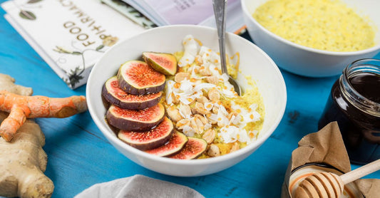 A bottle of turmeric supplement capsules on a clean white surface, representing the best turmeric UK 2026 options.