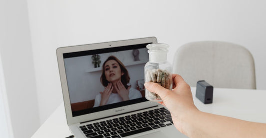 Soluble fibre supplement jar and scoop on a clean surface