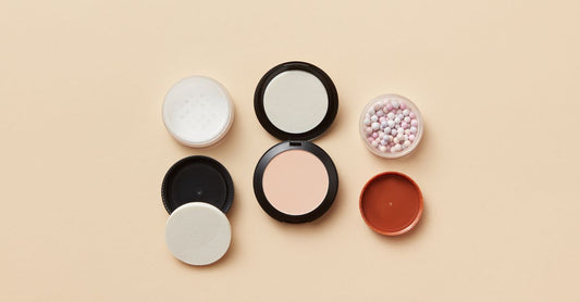 Selection of supplement powder jars arranged on a clean surface, illustrating how to choose powders UK wisely.