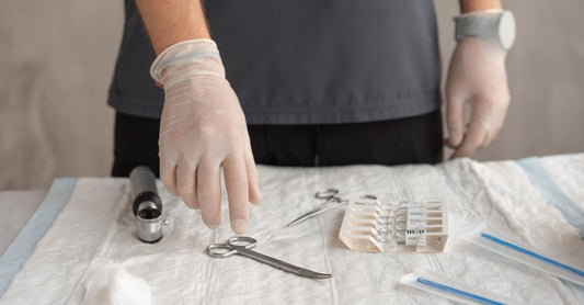 Medical gauze rolls and wound dressings laid out on a clean surface, illustrating a gauze buying guide UK.