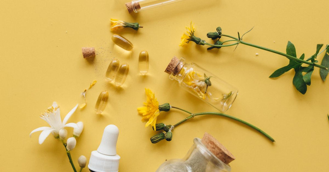 Best vitamin E UK 2026 supplement capsules and oil bottle on a neutral background.