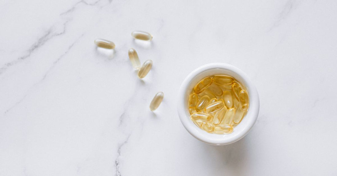 A row of fish oil supplement bottles lined up, representing the best fish oil UK 2026 options available at Nutrisentra.