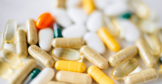 b-complex buying guide UK featuring assorted B-vitamin supplements arranged on a clean surface