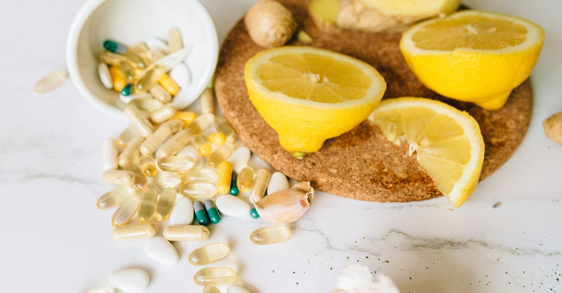 Fruit and vegetable supplement capsules in a glass jar on a wooden surface, representing a daily whole food nutrition boost.