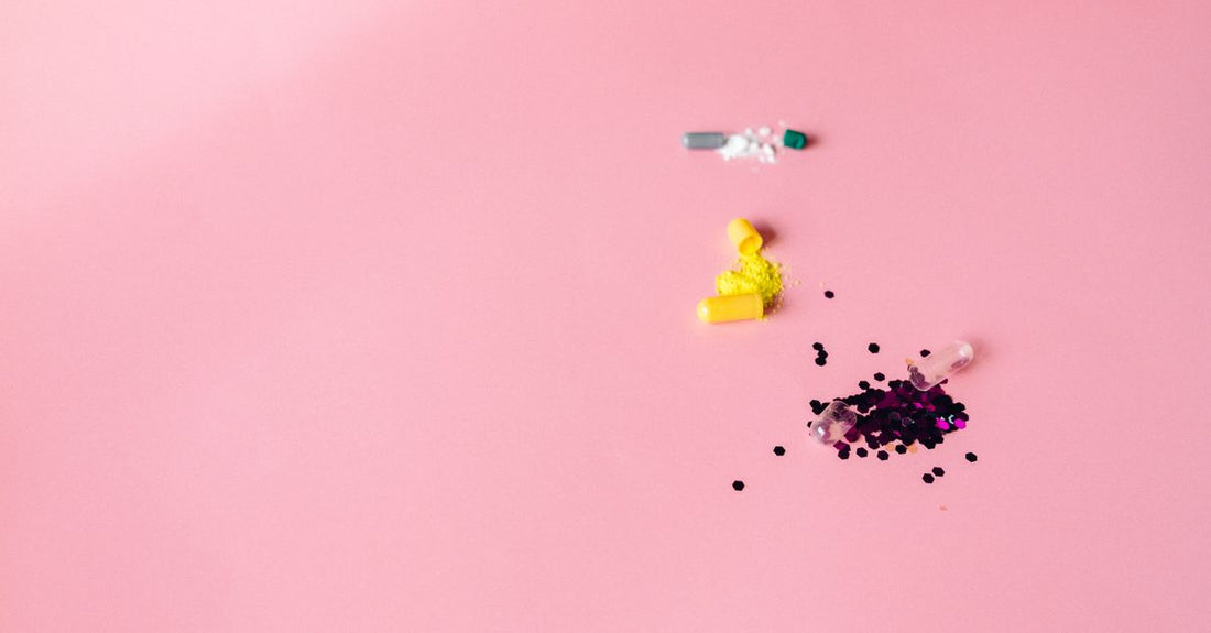 Colourful electrolyte powder packets arranged flat on a clean surface, illustrating how to choose electrolyte replacements UK.