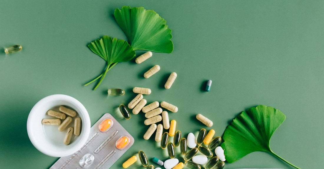 Assorted multivitamin capsules and softgels arranged on a clean surface, representing the best multivitamins UK 2026 available at Nutrisentra.