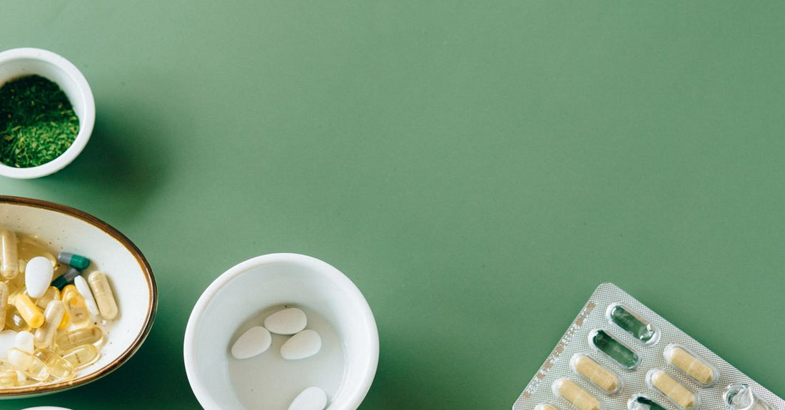Assorted fat burner capsules arranged on a clean surface, representing fat burner for women UK options.
