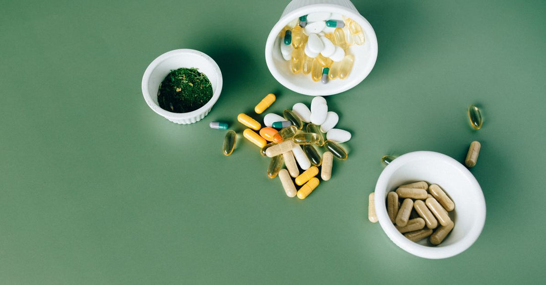 Bottle of digestive enzymes with probiotics capsules displayed on a clean white background, highlighting gut health supplements.