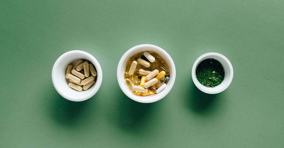 An assortment of eye health supplements, including softgels and capsules containing lutein and zeaxanthin, arranged on a clean white surface for the best eye health UK 2026.