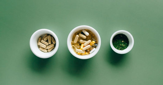 An assortment of eye health supplements, including softgels and capsules containing lutein and zeaxanthin, arranged on a clean white surface for the best eye health UK 2026.