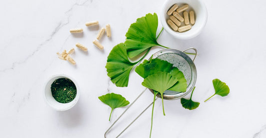L-glutamine supplement powder in a jar with a scoop, representing l-glutamine for leaky gut