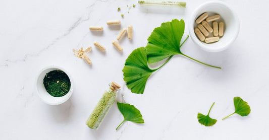 Flatlay of diet and sports nutrition supplement powders and shaker bottle for UK buying guide 2026