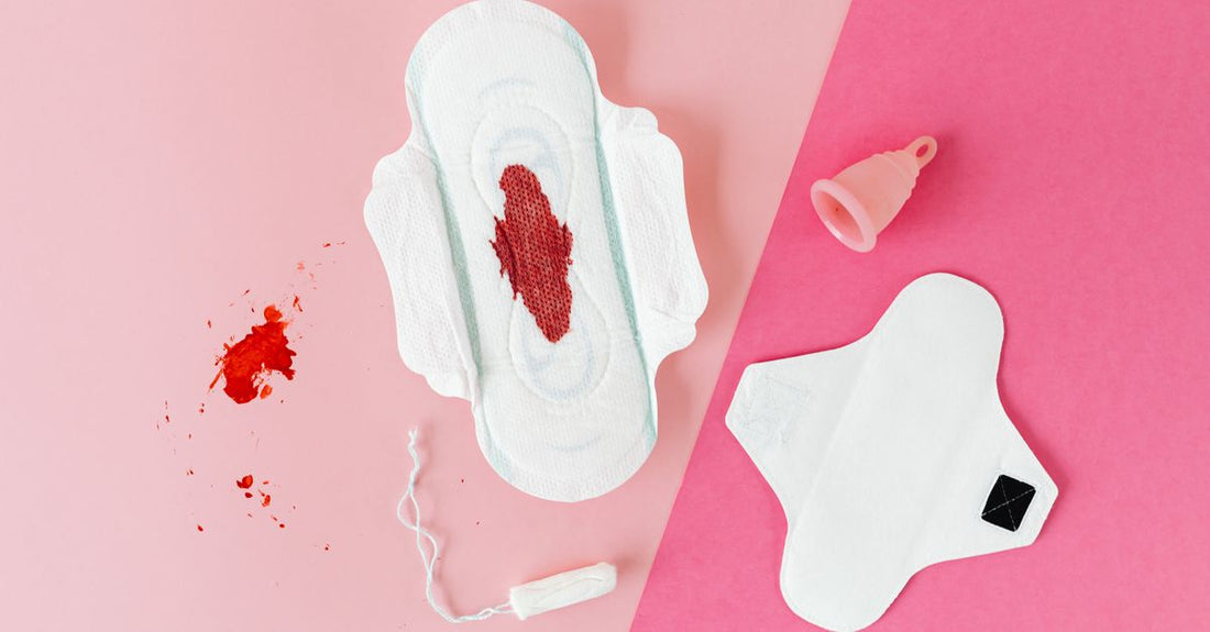 Menstrual cup and tampon side by side on a clean surface illustrating menstrual cup vs tampon choice