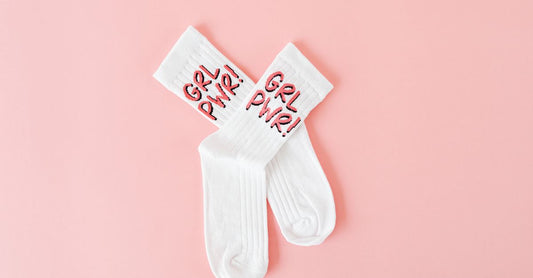 A flatlay photograph of memory foam insoles and cushioned socks on a neutral background, illustrating a socks & insoles buying guide UK shoppers can trust.