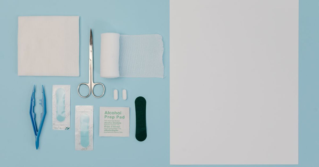 Stack of sterile gauze pads 4x4 individually wrapped on a clean surface
