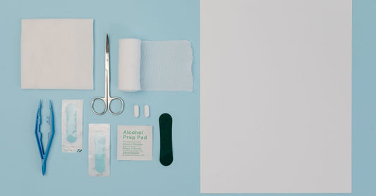 Stack of sterile gauze pads 4x4 individually wrapped on a clean surface