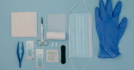 A 2-inch sterile gauze roll on a clean white background, showing the open-weave texture and sealed sterile packaging.