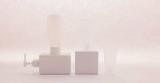 A white supplement bottle of ashwagandha capsules on a clean surface, representing where to buy ashwagandha online in the UK.