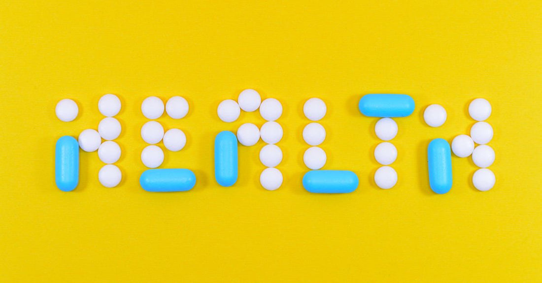 A flat lay of detox and cleanse supplement bottles and gummies on a light surface, illustrating the UK buying guide.