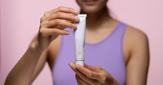 Tube of athletes foot treatment cream on white background