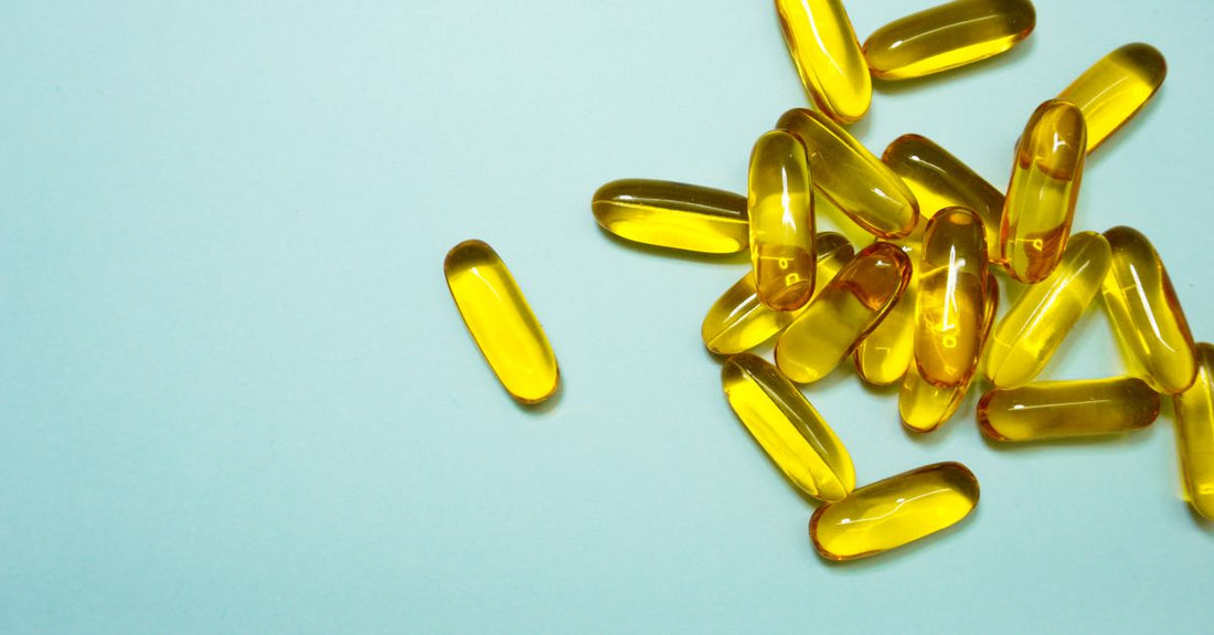 Lutein supplement capsules on a white surface, representing lutein for macular degeneration support.