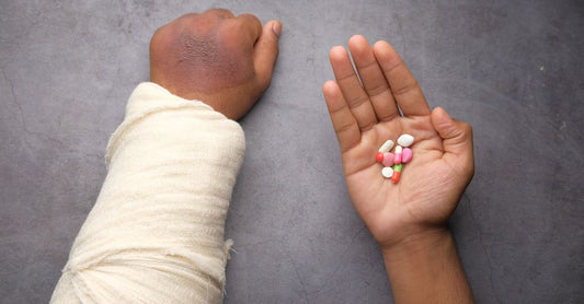 A selection of adhesive bandages and plasters in various materials and sizes arranged on a clean surface, illustrating an adhesive bandages buying guide for UK shoppers.