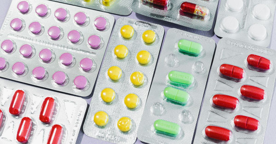 A flatlay of various adhesive bandages and medical dressings on a clean surface, illustrating options for where to buy adhesive bandages online in the UK.