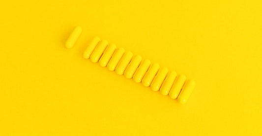 A bottle of lutein supplements on a clean surface, illustrating a lutein buying guide UK for eye health.