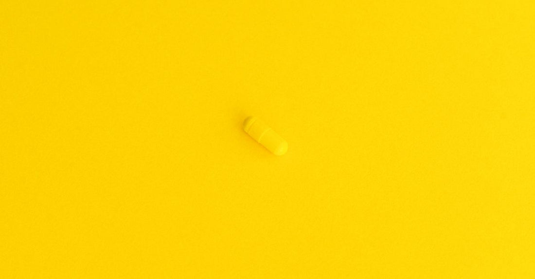 Vitamin B6 pyridoxal phosphate supplement tablets on a clean surface, highlighting b6 pyridoxal phosphate benefits.