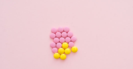 An arrangement of vitamin and mineral supplement bottles representing the best combinations UK 2026 for optimal health.